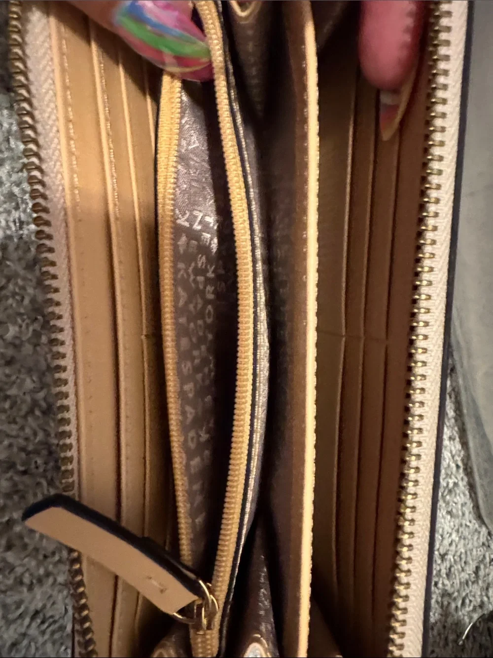 kate spade zip-around pebble leather wallet in light beige
